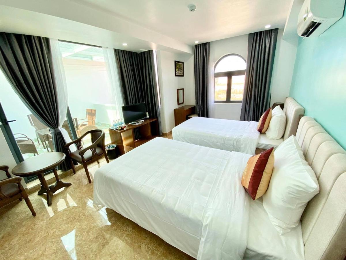 กงทัญ ลองบีช โฮเต็ล Hotel Cam Lam ภายนอก รูปภาพ